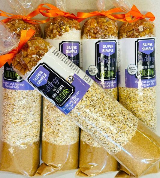 Crafty Cook Coconut and Apricot Flapjack Mix gluten-free packaged in a clear container with ingredients visible
