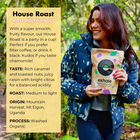 Organic House Roast Coffee by Exhale Healthy Coffee, showcasing a fresh, roasted coffee bean bag on a wooden table.
