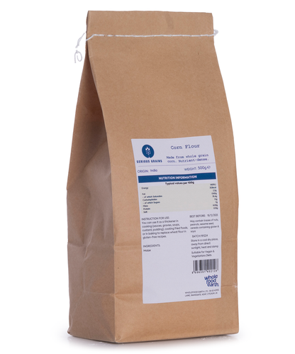 Whole Food Earth corn flour in a 500g bag, showing fine yellow cornmeal for baking and cooking.