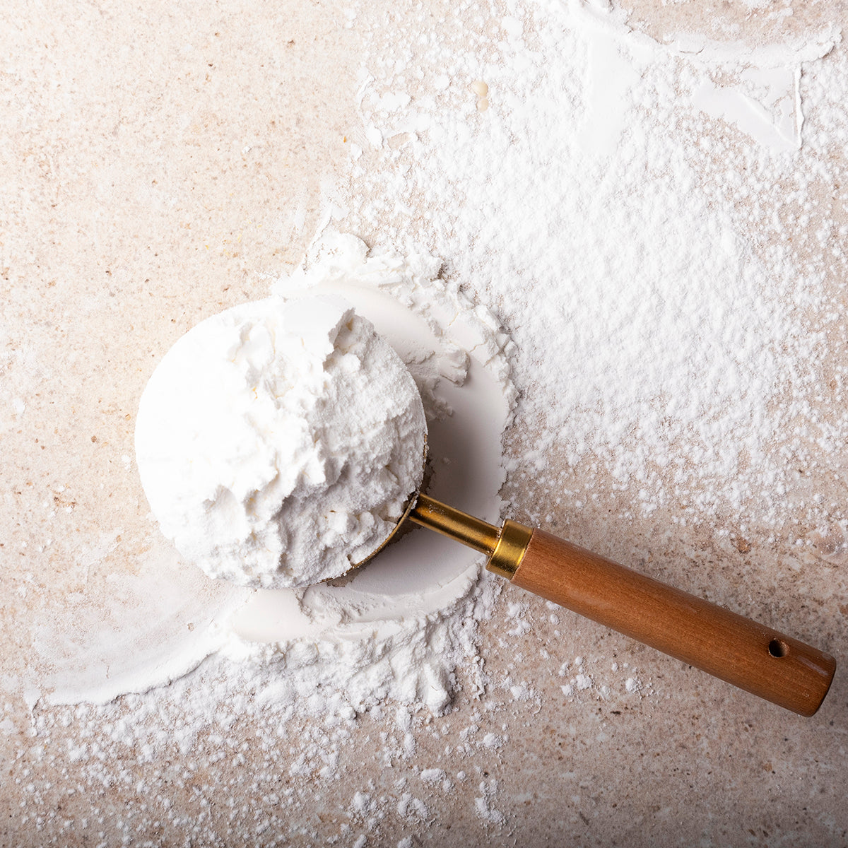 Organic corn flour from Serious Grains by Whole Food Earth, showing fine yellow cornmeal on a neutral background.
