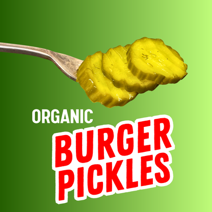 Crinkle-cut organic dill and garlic burger pickle slices on a fork, showcasing fresh, crunchy pickled cucumbers from PICKLEBITS.