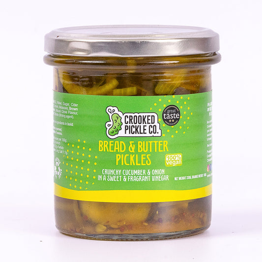 Jar of Crooked Pickle Co. Bread & Butter Pickles with sliced cucumbers and sweet, tangy glaze in a glass jar.