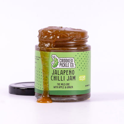 Three jars of Crooked Pickle Co's Chilli Jam Trio featuring vibrant labels and varying shades of red and orange chili jams.