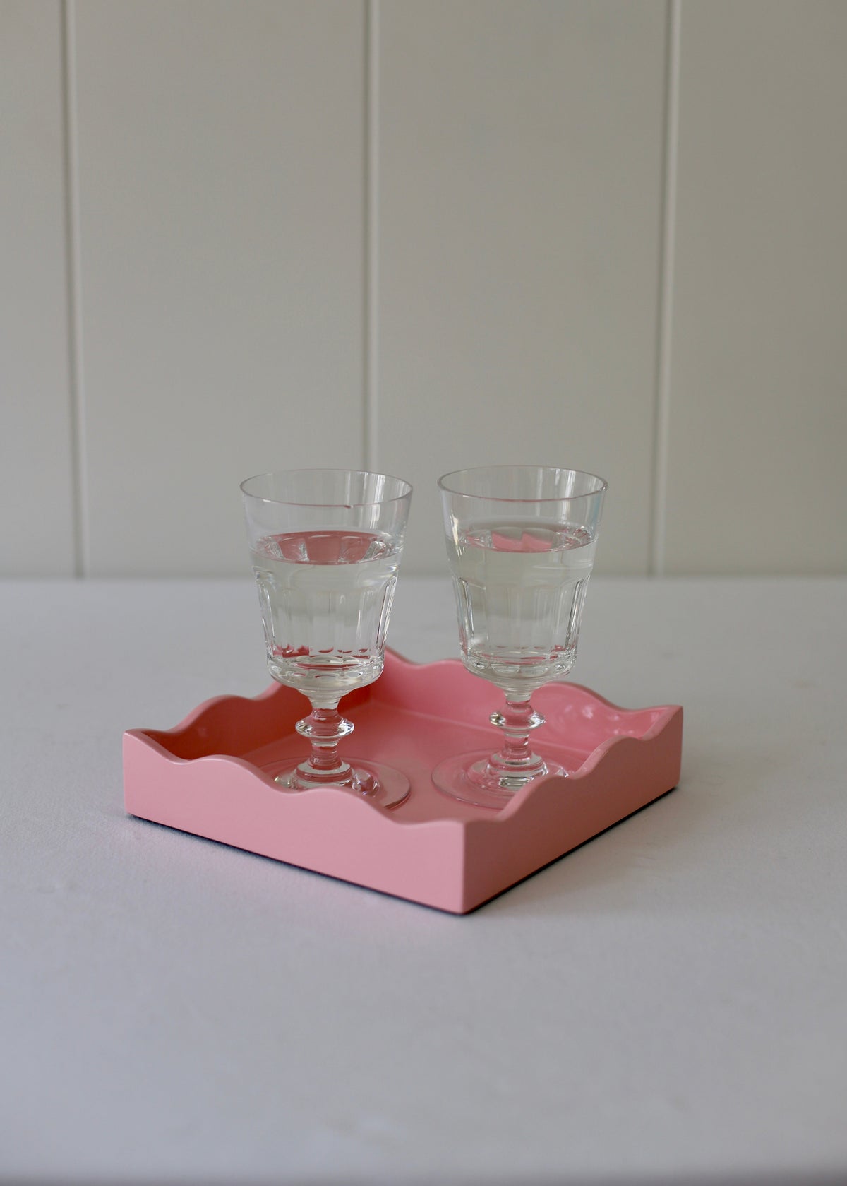 Pink Square Allegra Tray by domenicamarland, showcasing a sleek lacquered surface and modern design.