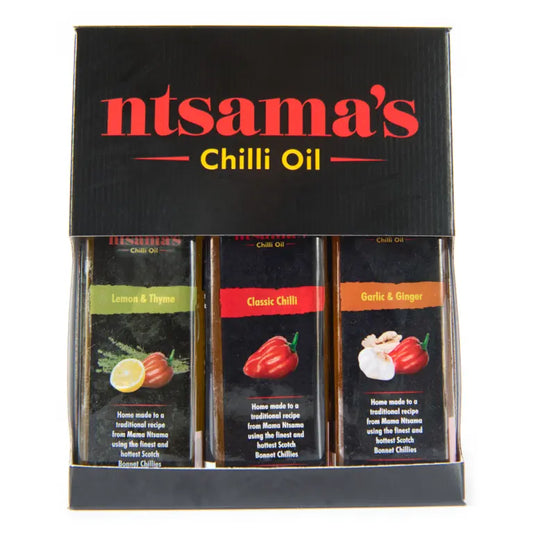Chilli oil gift set from ntsama.co.uk with bottles of spicy chili oil and decorative packaging on a neutral background.