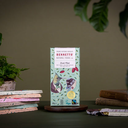 Dark mint chocolate by Bennetto Natural Foods UK, showing a close-up of rich dark chocolate with a mint filling.