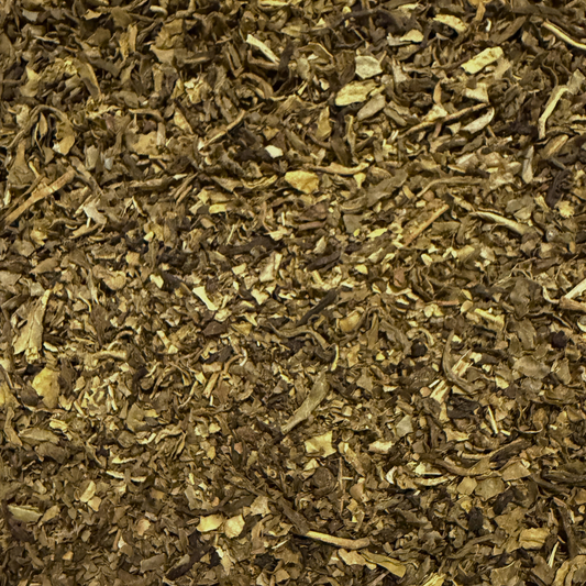 Loose leaf Decaf Kyushu Sencha green tea by Porter Hill Tea Company, showcasing vibrant green tea leaves.