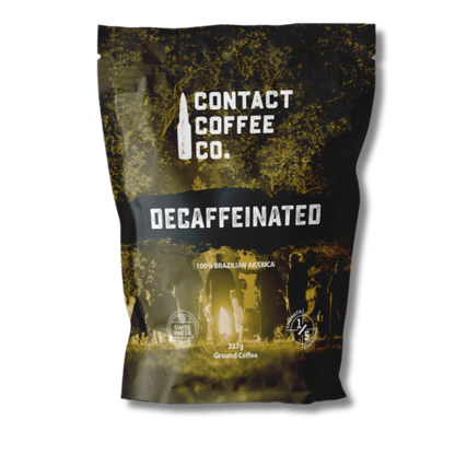 Decaffeinated coffee from Contact Coffee Company Ltd., showing a bag of premium decaf coffee beans.