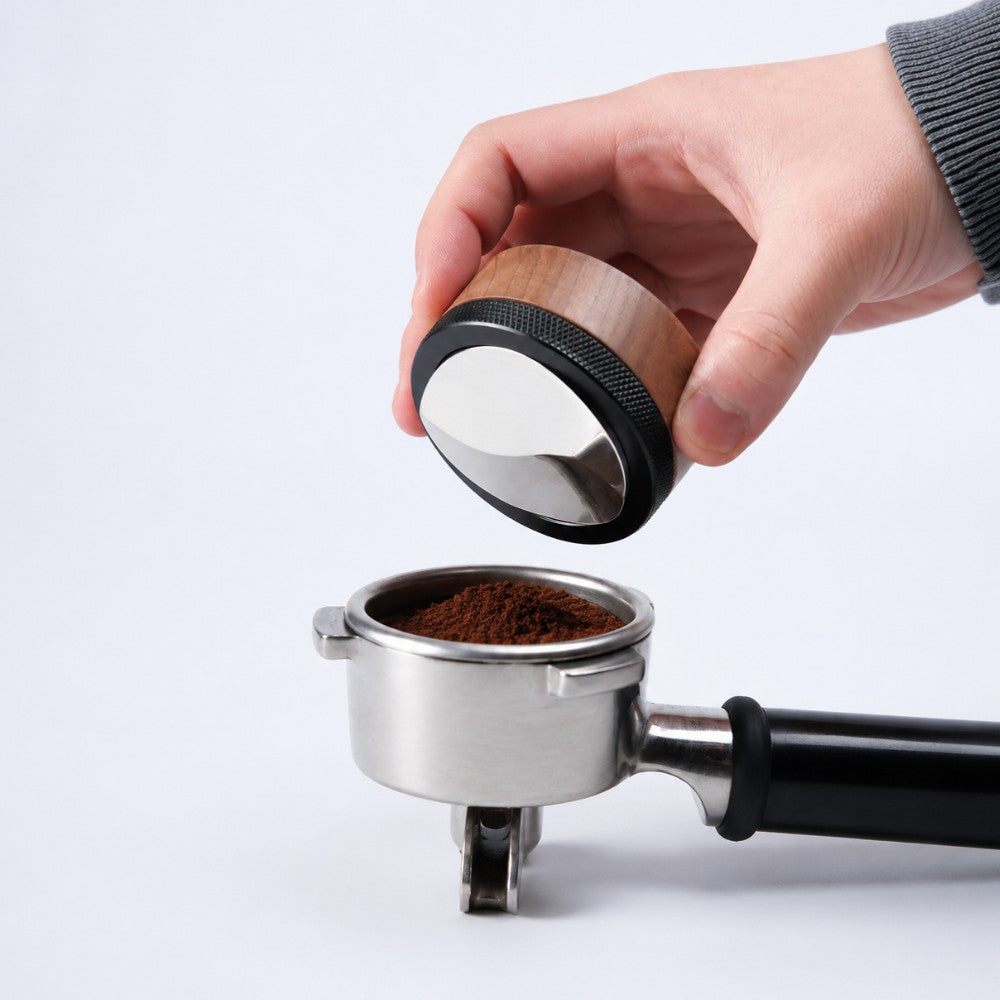 KNOCDIC® Walnut adjustable espresso distribution tool in use, showing its ergonomic design for even coffee grounds distribution.