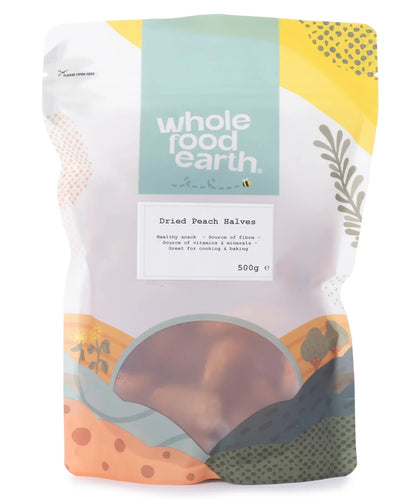 Assorted dried peach halves from Whole Food Earth, showcasing vibrant orange slices of dried fruit on a neutral background.