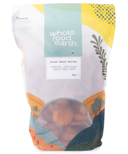 Dried peach halves from Whole Food Earth, organic dried fruits with bright orange, chewy slices on a white background.