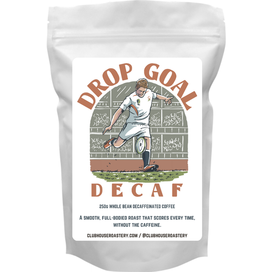 Bag of Drop Goal Decaf coffee from Clubhouse Roastery, featuring a sleek label and rich, roasted coffee beans.