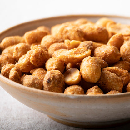 Dry roasted peanuts from Whole Food Earth, close-up of crunchy, golden nuts in a bowl, perfect for snacking or recipes.