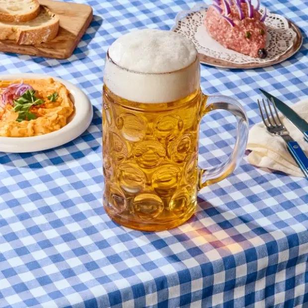 Stolzle 2 Pint Glass Tankard with 1.3L capacity, clear glassware UK brand, featuring a sturdy handle and classic design.