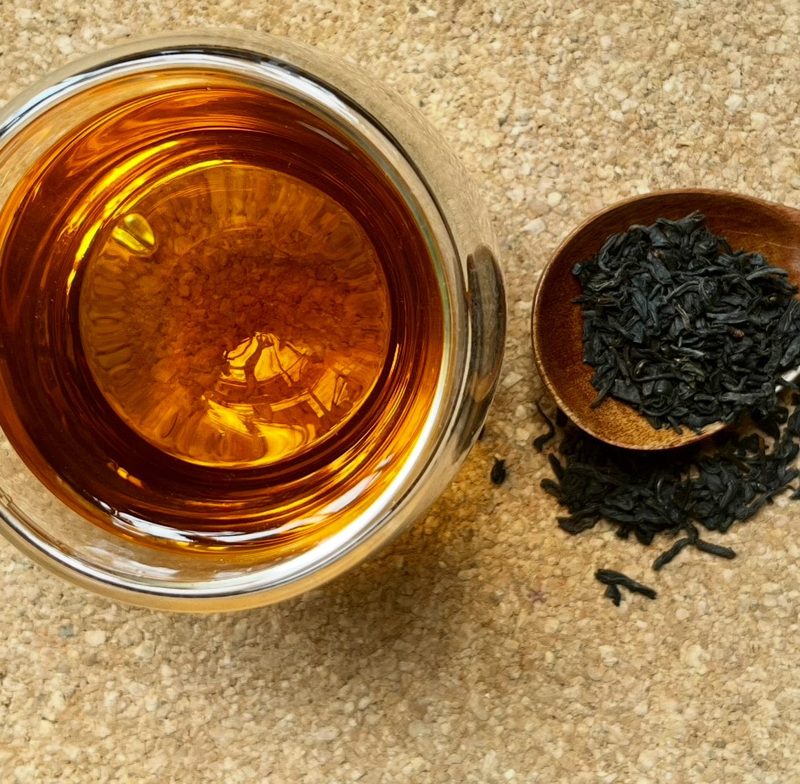 Porter Hill Tea Company's Emperor Butterfly Lapsang Souchong black tea in a packaging bag with a butterfly illustration.