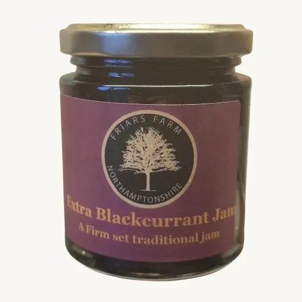 Jar of Friars Farm Extra Blackcurrant Jam 200g with dark purple jam visible inside, featuring a label and a wooden spoon.