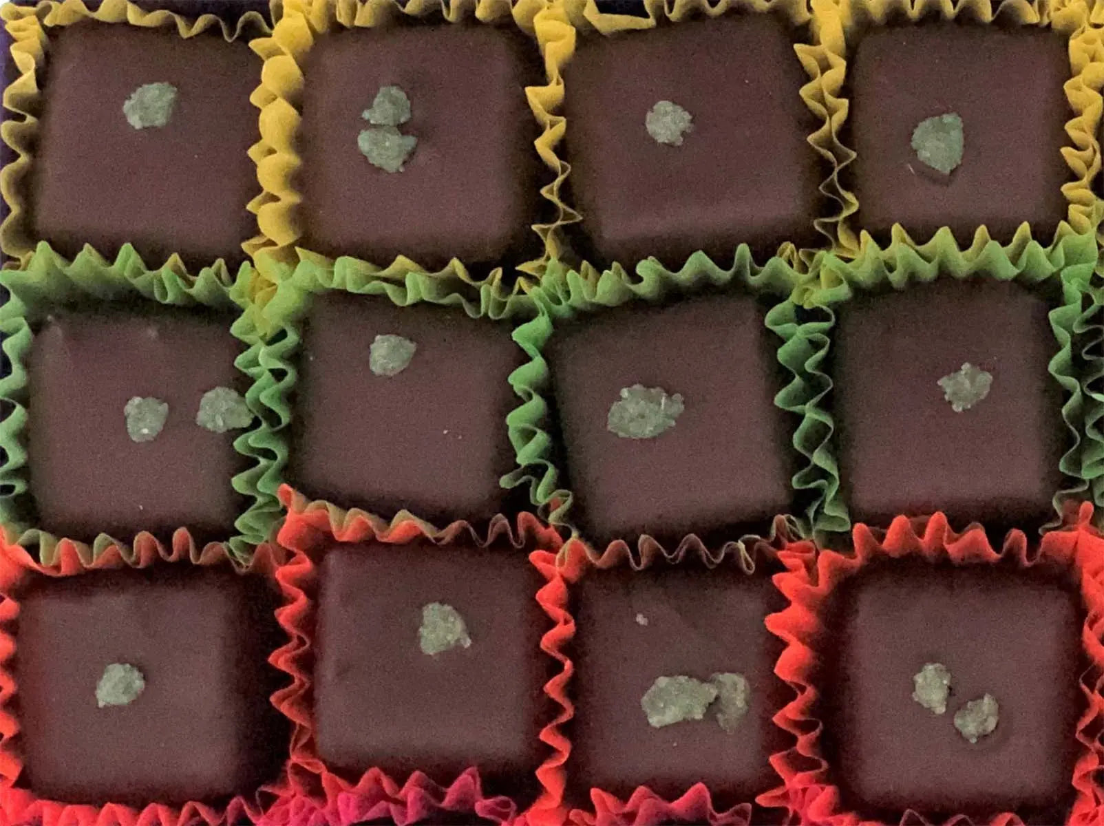 Fresh mint leaves in a baby box, showcasing vibrant green herbs by Gorvett & Stone.