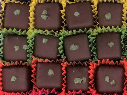 Fresh mint leaves in a baby box, showcasing vibrant green herbs by Gorvett & Stone.