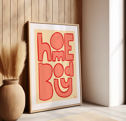 Orange typographic wall art print from Peak Prints featuring the phrase "Homebody" for relatable living room decor.