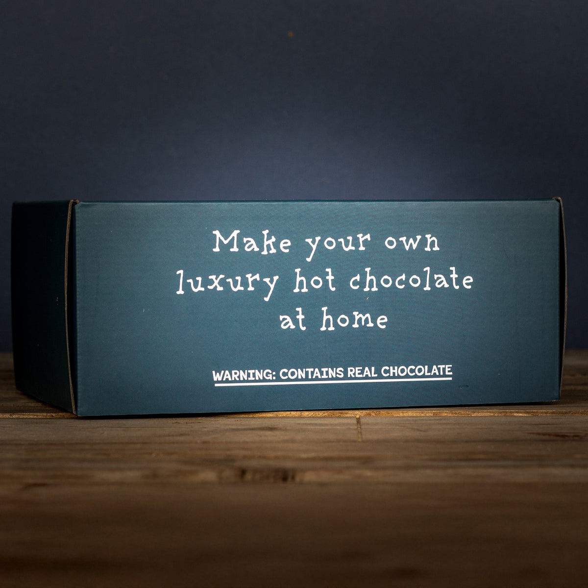 Harry's Hot Chocolate making kit in a gift box, includes hot chocolate mix, marshmallows, and accessories for cozy winter drinks.