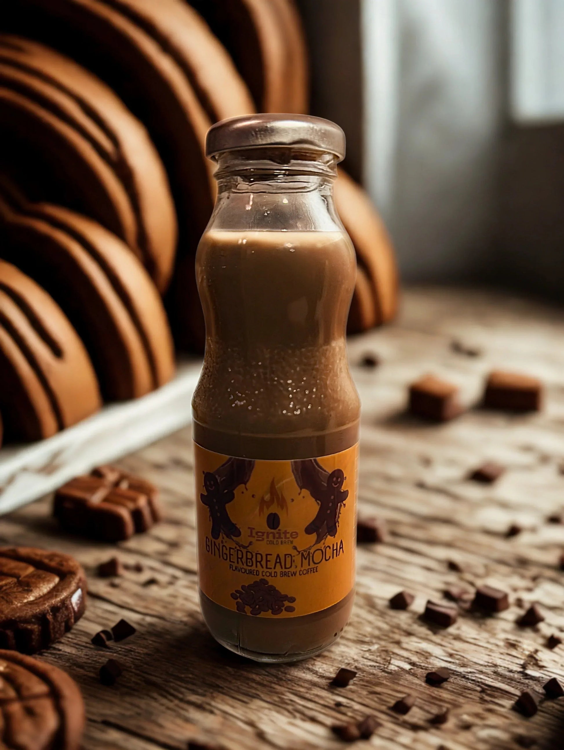 Six Ignite Coffee Co Mocha Pack cold brew bottles with gingerbread mocha flavor in a box, ready for refreshment.