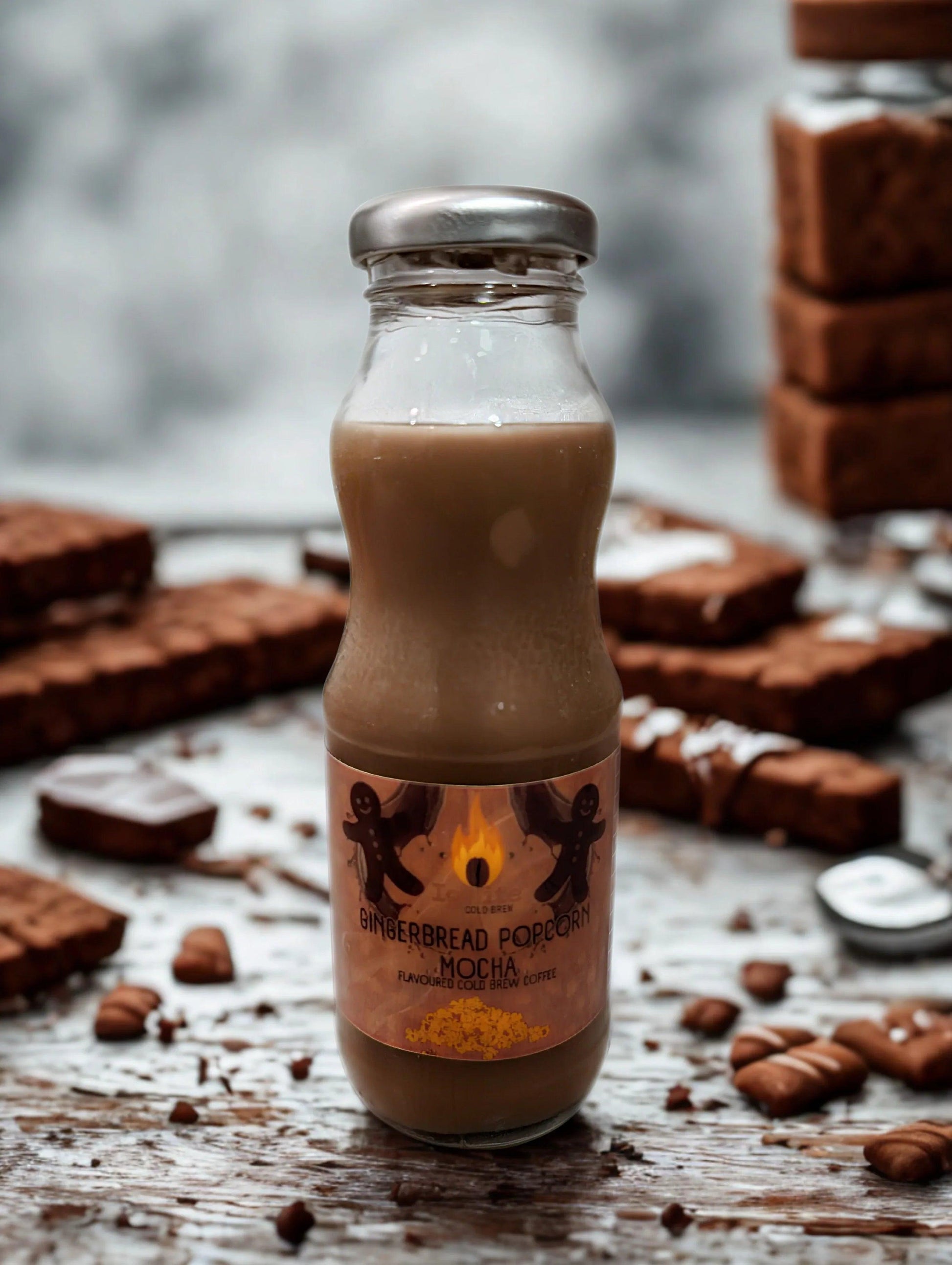 Six gingerbread popcorn mocha cold brew packs by Ignite Coffee Co, featuring velvety chocolate mocha with popcorn twist.
