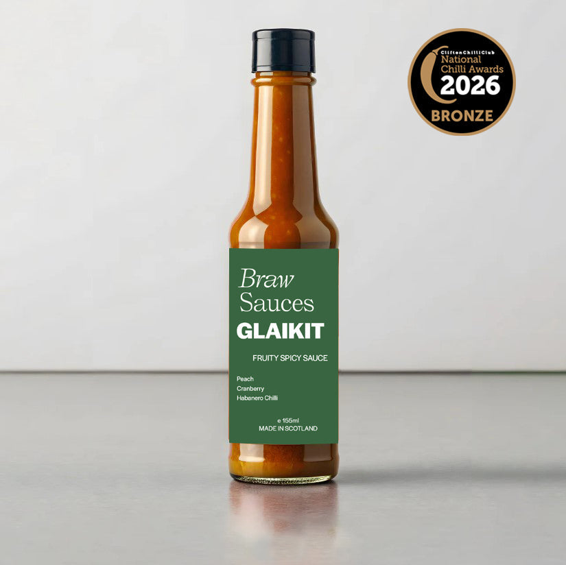 Braw Sauces Glaikit sauce in a jar, with a label featuring the product name and branding, ready for use in cooking or as a condiment.