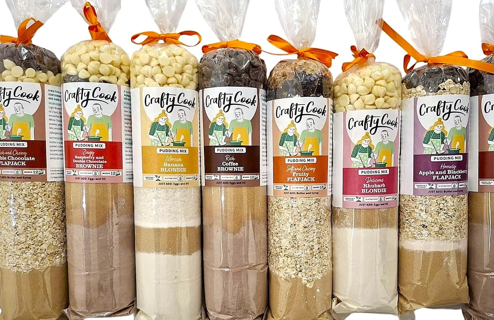Crafty Cook Hamper10 savory and sweet bundle with gluten-free puddings, featuring an assortment of baked treats and desserts.