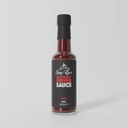 Spicy Ryes Hot Honey Pepper Sauce bottle with spicy red peppers and honey, showcasing the hot sauce's vibrant label and rich texture.