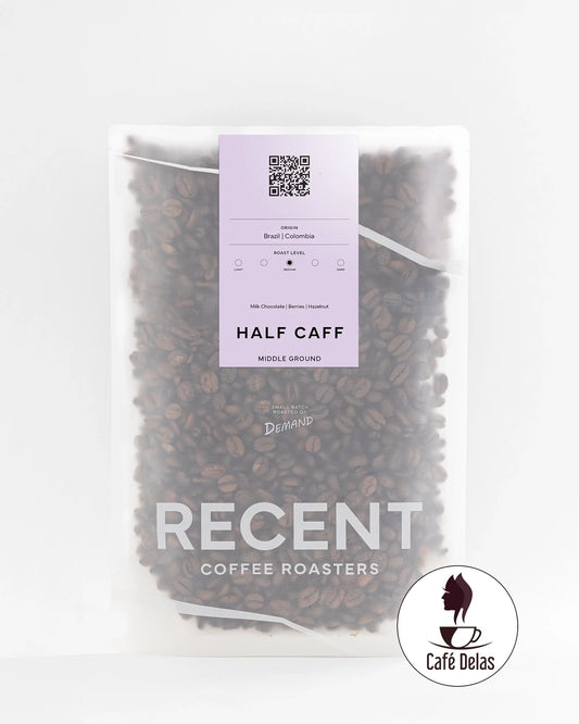 Recent Beans Middle Ground Medium Roast Coffee in a bag, showing the coffee branding and packaging design.