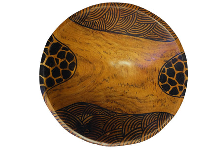 Hand-carved African art wooden bowl by Goch & Co, showcasing intricate traditional patterns and natural wood finish.