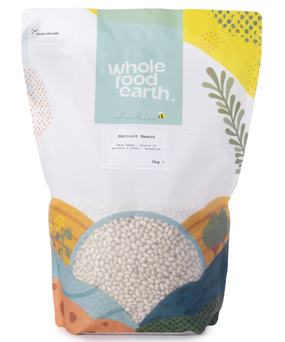 Whole Food Earth haricot beans in a 3kg bag, showing small, pale beige beans suitable for soups and stews.
