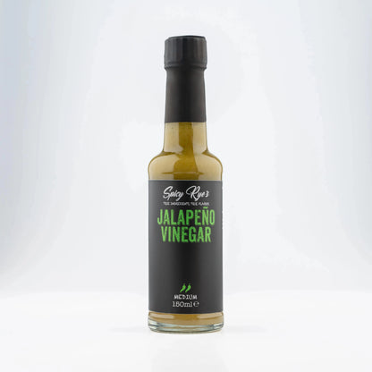 Spicy Ryes jalapeño vinegar bottle with vibrant green jalapeño peppers on the label, showcasing the spicy condiment.