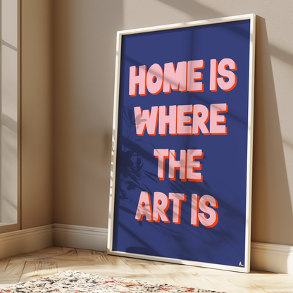 Colorful typographic wall art print reading "Home Is Where The Art Is" by Peak Prints, featuring bold, vibrant design for maximalist home decor.