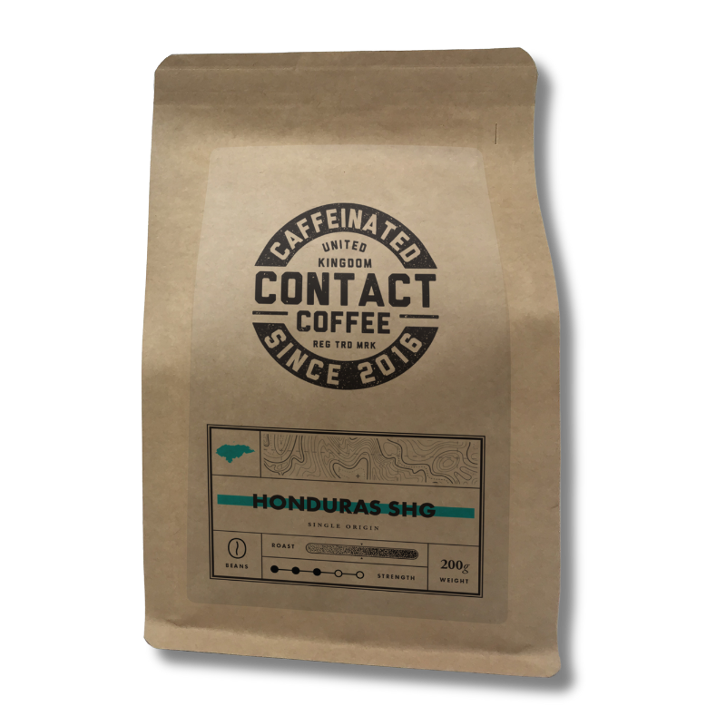 Single origin Honduras SHG coffee beans from Contact Coffee Company Ltd., showing fresh, roasted coffee beans in a natural setting.