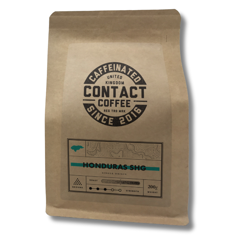Ground Single Origin Honduras SHG coffee from Contact Coffee Company Ltd., showcasing rich, aromatic coffee grounds in a bag.