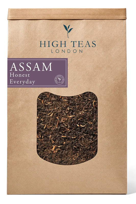 Loose leaf Honest Everyday Assam OP1 tea from High Teas, featuring vibrant orange pekoe leaves for a rich breakfast brew.