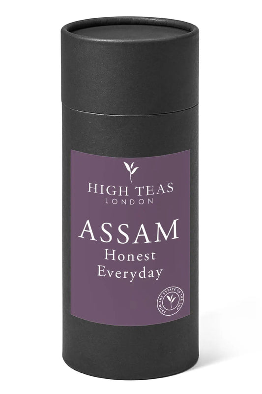 Loose leaf Honest Everyday Assam OP1 tea by High Teas with orange pekoe leaves in a clear glass jar.