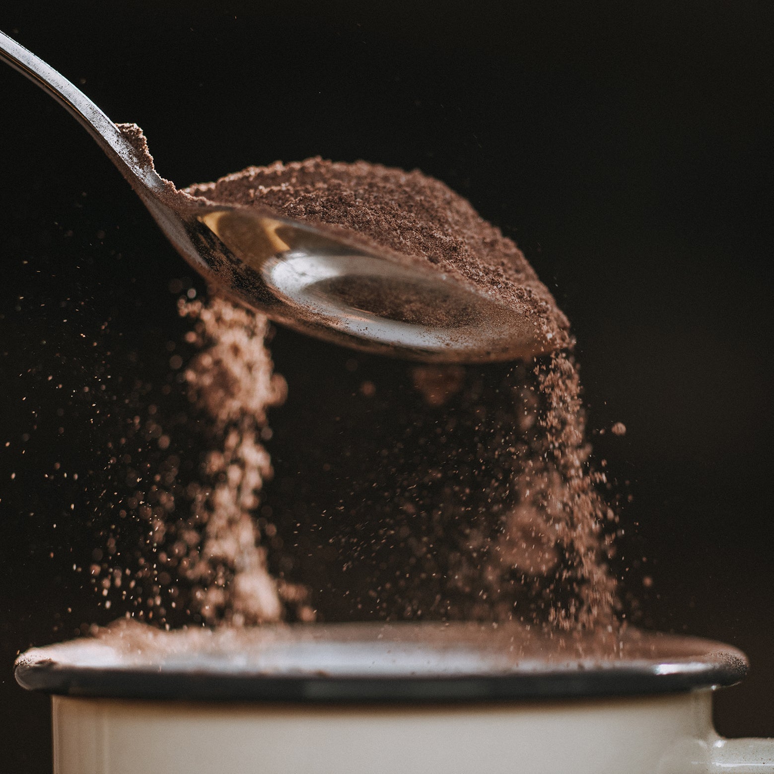 Harry's Hot Chocolate 70% hot chocolate in a cup with a spoon, showcasing rich, creamy hot chocolate ready to enjoy.