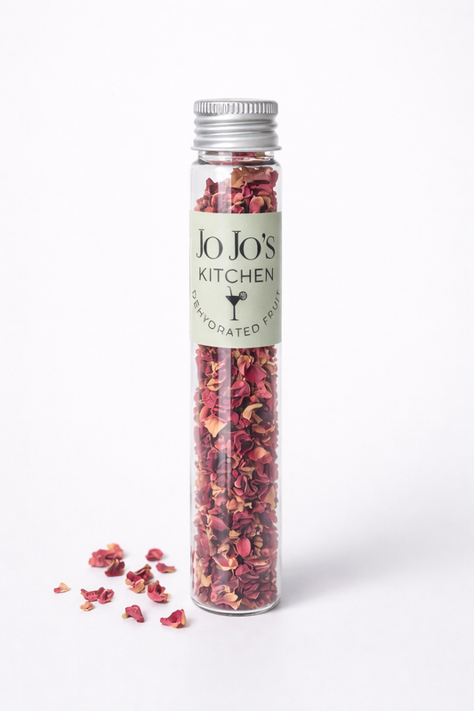 Edible rose petals from JoJo’s Kitchen, vibrant pink and red flower petals, suitable for garnishing desserts and drinks.