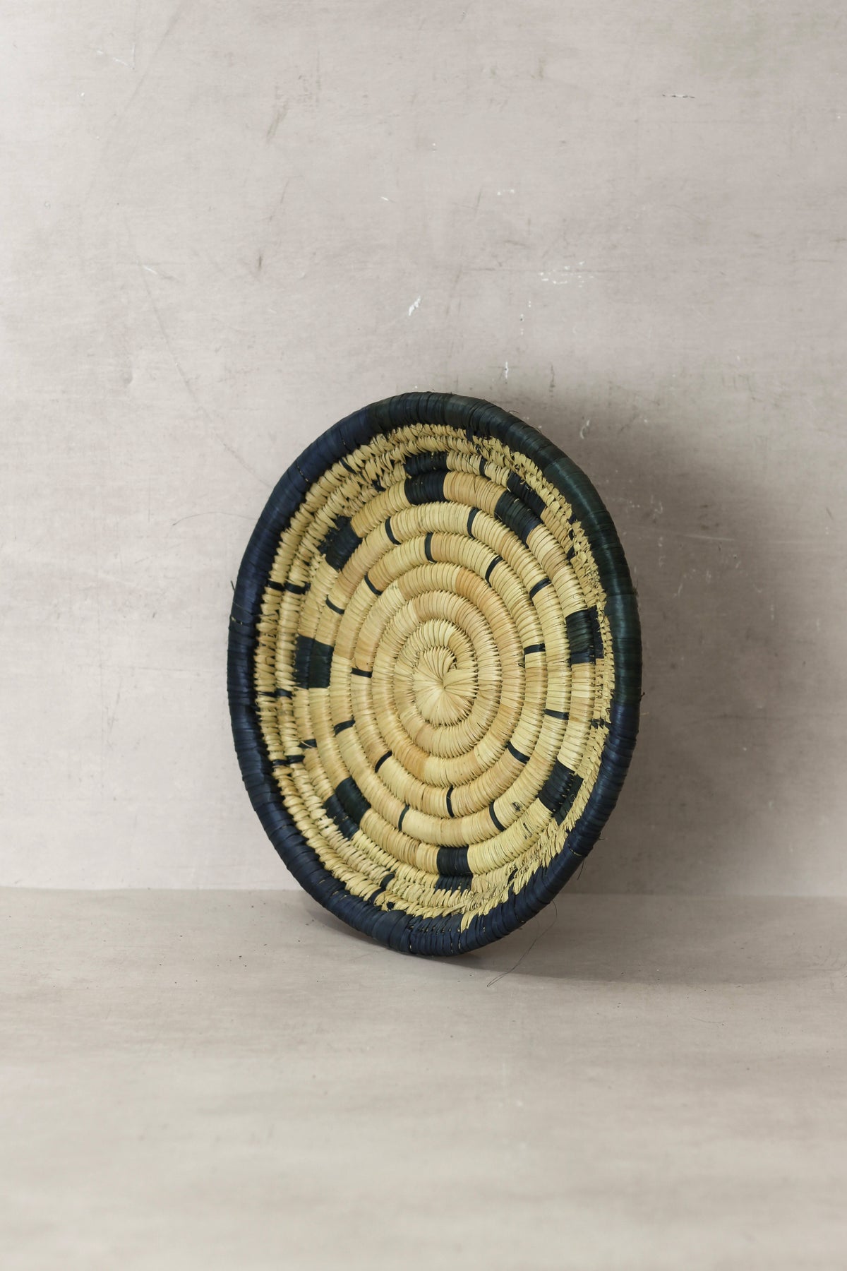 Small Malawi Wall Basket No 12 by Botanical Boys, a decorative woven wall art piece showcasing natural textures and craftsmanship.