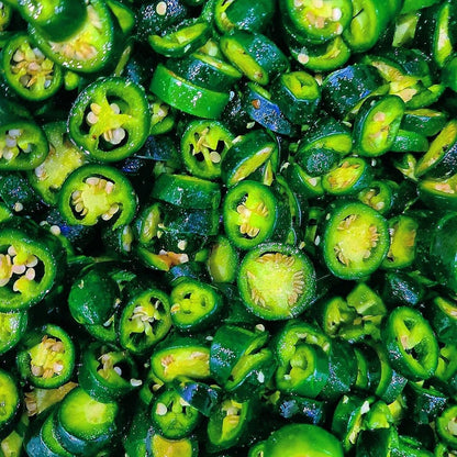 Jar of Lou's Brews Cowboy Candy, spicy candied jalapeños in a glass jar, perfect for adding heat and sweetness to dishes.