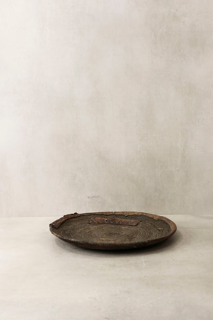 Handwoven Chad wall basket by Botanical Boys, 41.3 inches, showcasing intricate natural fiber craftsmanship and decorative design.
