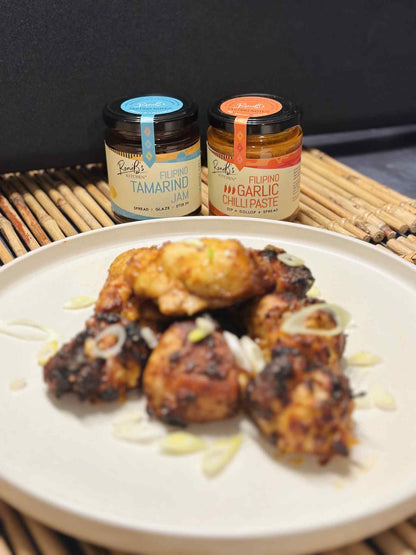 Filipino tamarind jam by RoniBs Kitchen, featuring tarsier gin, served with cheese, in a jar with a label.