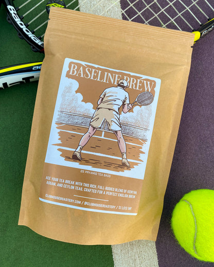 English Breakfast tea from Clubhouse Roastery featuring a box of Baseline Brew tea bags with a steaming cup of brewed tea.