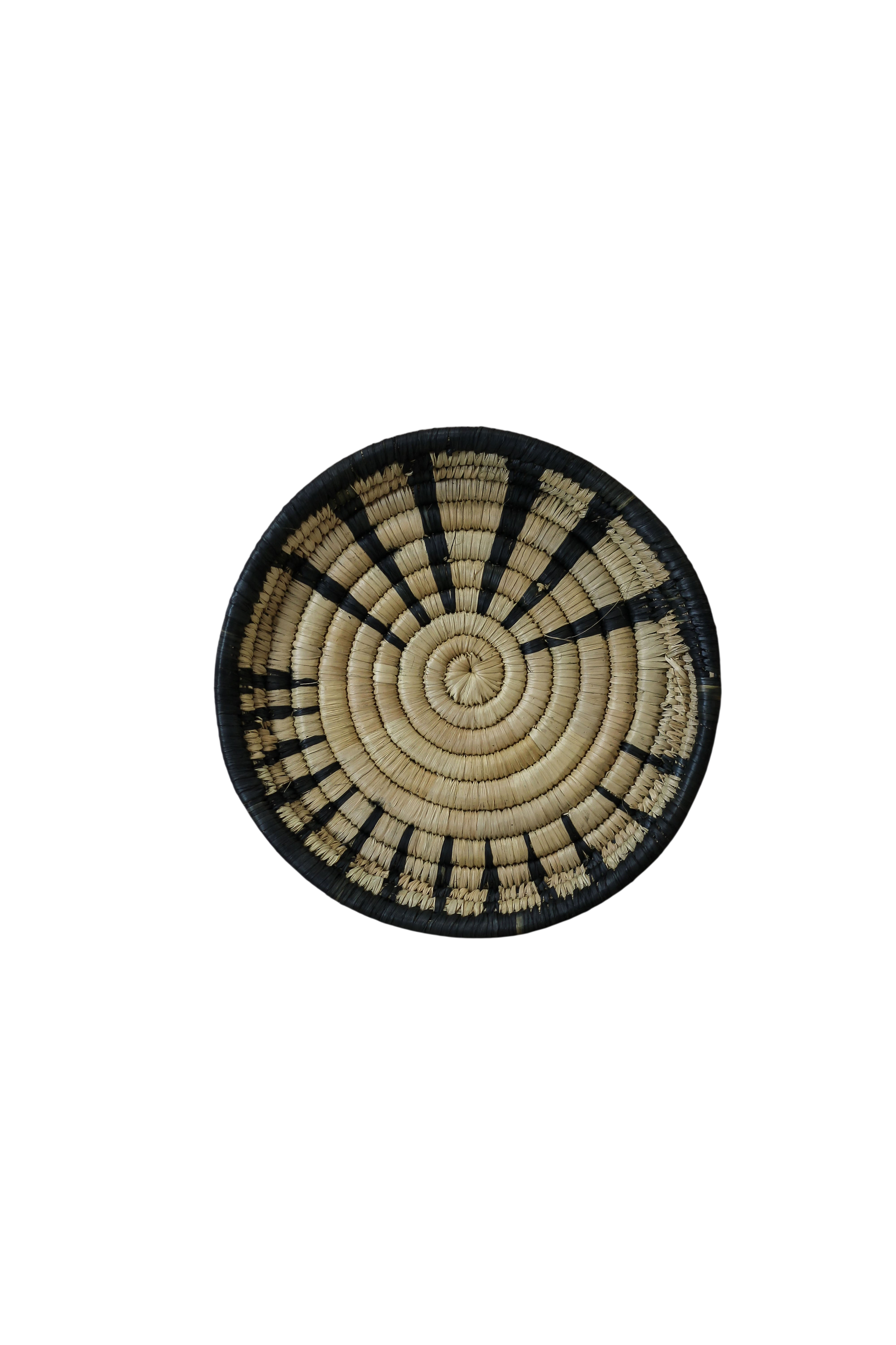 Small Malawi wall basket by Botanical Boys, woven basket with natural fibers, mounted on a wall for decorative storage.