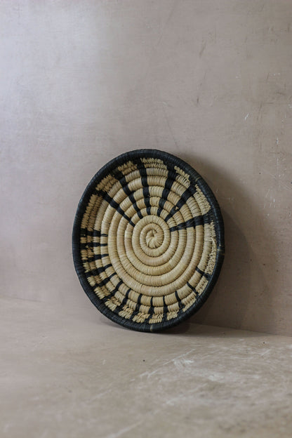 Small Malawi Wall Basket No 1 by Botanical Boys, woven basket with natural fibers, designed for wall decor or storage.