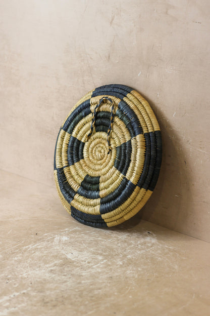 Small Malawi Wall Basket No 6 by Botanical Boys, woven wall art featuring intricate natural fiber design.