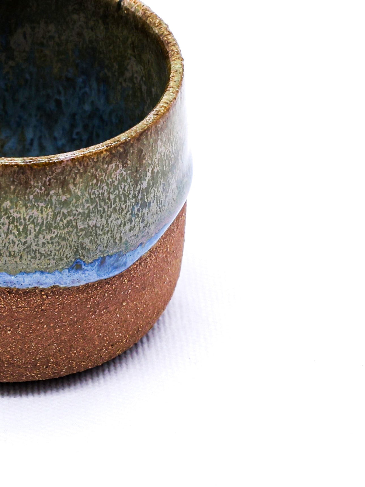 Handmade ceramic Terra Stoneware espresso mug by Ribera Handmade Ceramics, featuring a rustic, textured finish and a comfortable handle.
