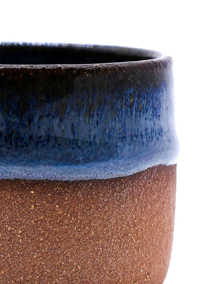 Handmade ceramic Picollo espresso mug with terra stoneware finish from Ribera Handmade Ceramics, showcasing its textured surface and compact design.
